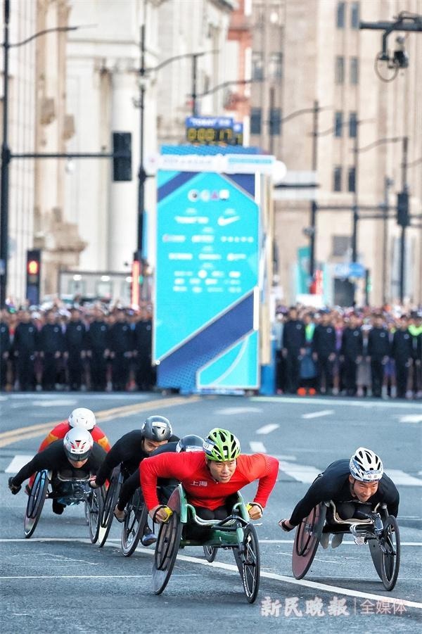 3.8万跑者炽热心，上马鸣枪见证城市脉动与温度  第1张