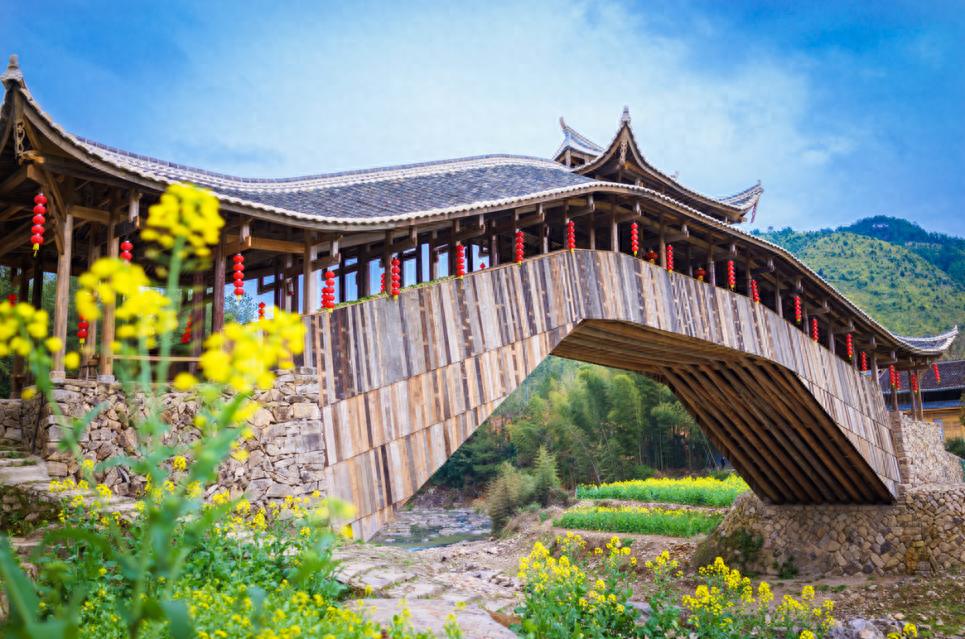 中国木拱桥传统技艺荣登世界舞台，温州泰顺廊桥从濒危走向振兴  第1张
