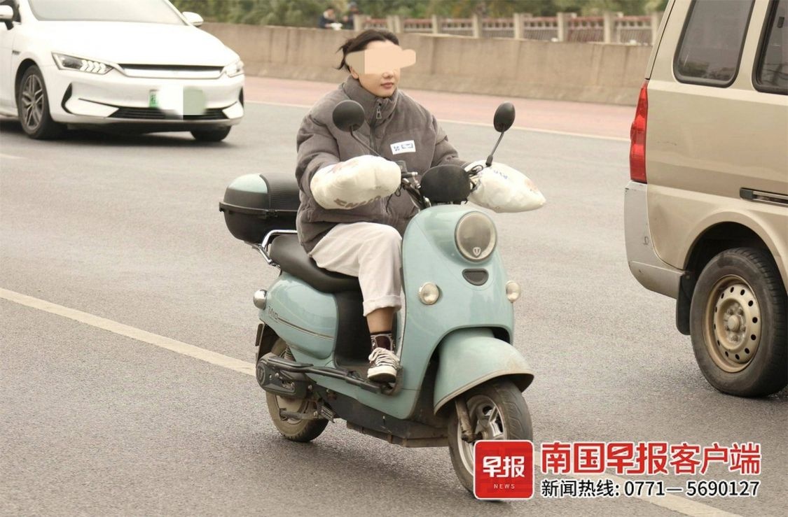 南宁电驴骑手御寒神器大比拼：保暖与安全，你选哪个？  第4张