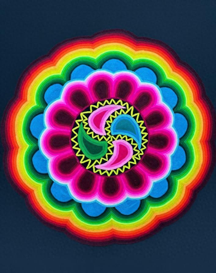 土族盘绣：国家级非遗，太阳花纹背后的神秘力量