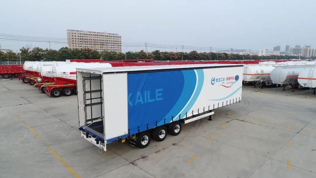 全国首款大容积边贸款侧帘布厢式半挂车，背后的研发生产团队有多强大？  第4张