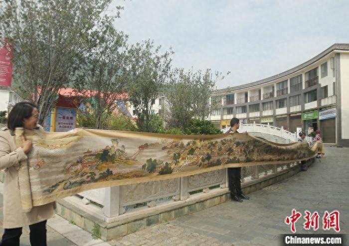 耗时 7 年！彝族非遗传承人普玉珍手绣 21 米清明上河图