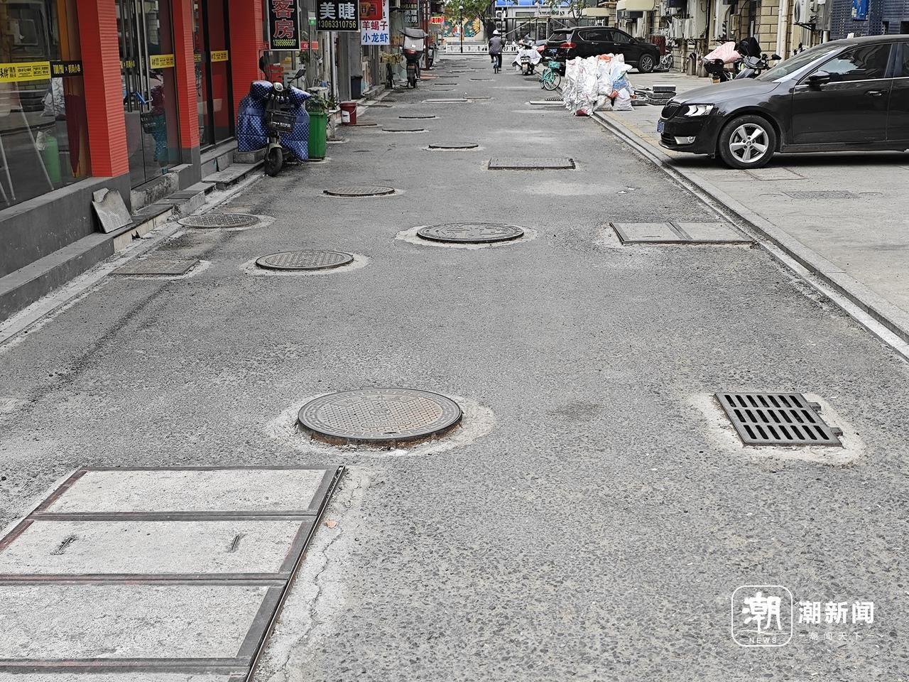 杭州一小区井盖密集，竟达 50 个之多，凸起的井盖是否影响通行？记者实地探访  第2张