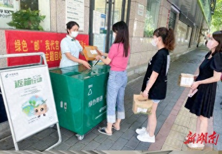 绿色邮政行动：一年回收470万个瓦楞纸箱，你的快递箱也能‘绿动’未来  第1张
