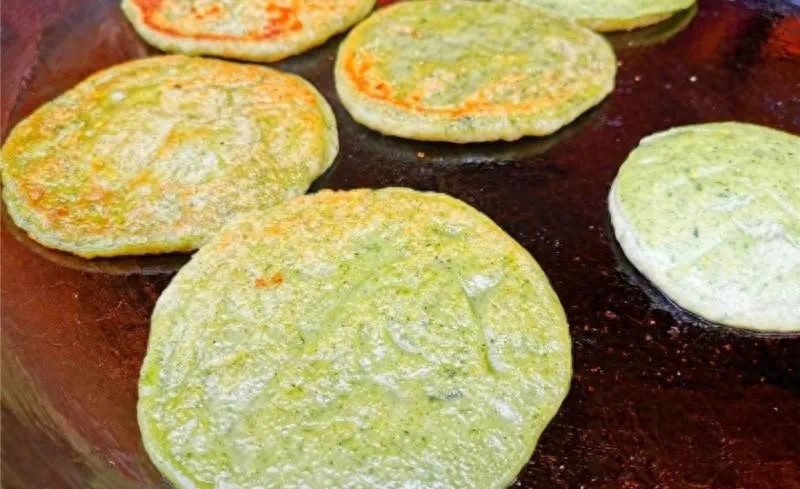 春意盎然时，为何丘北县的壮家儿女都在争相制作祭竜粑粑？  第1张