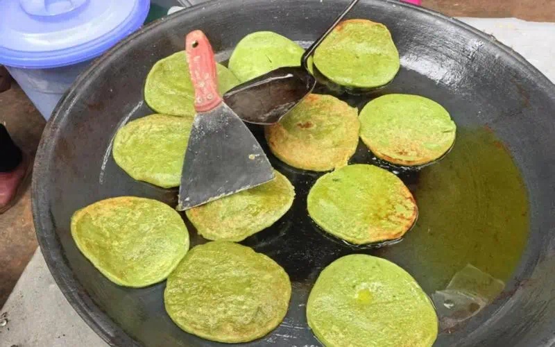 春意盎然时，为何丘北县的壮家儿女都在争相制作祭竜粑粑？  第4张